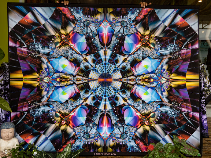 Colorful abstract fractal design with a central geometric pattern and crystal.
